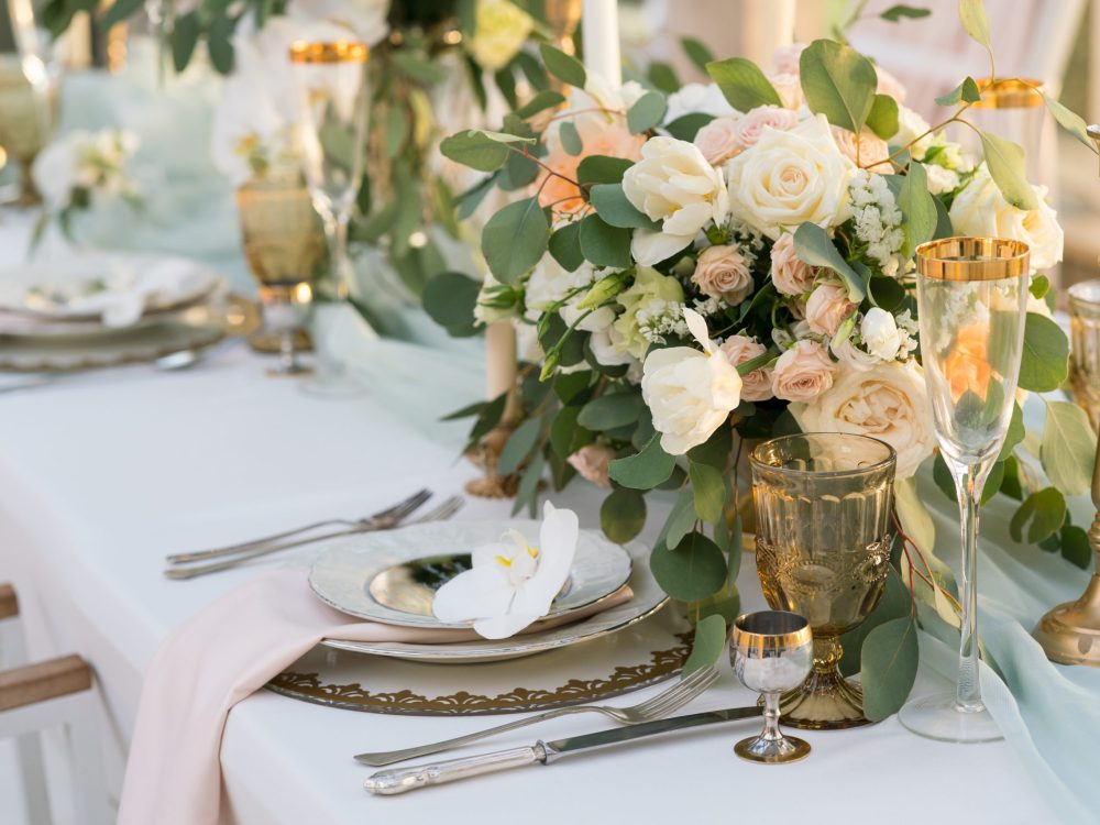 beautifully decorated table with flowers for wedding party